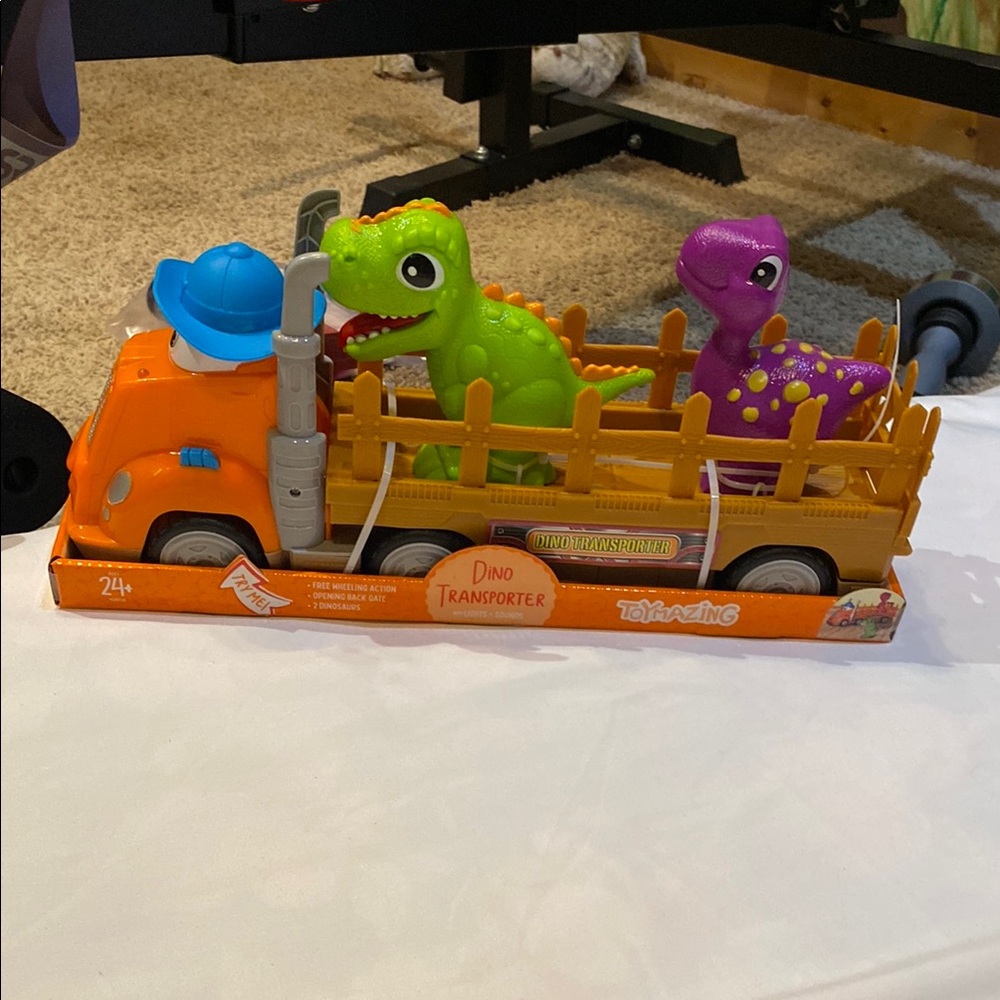 Dino Transporter Truck with Dinosaurs - Orange, Green, and Purple